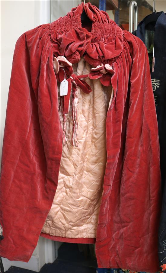 A rose velvet 1920s cape with pale pink silk lining